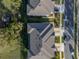 Overhead view of home showing roof and nearby street at 6972 Ripple Pond Loop, Zephyrhills, FL 33541