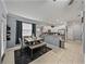 Contemporary dining area adjacent to the kitchen, featuring a modern table and comfortable seating at 6972 Ripple Pond Loop, Zephyrhills, FL 33541