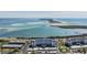 Aerial perspective showcasing a coastal building and its expansive view at 7 Elgin Pl # 502, Dunedin, FL 34698