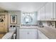 Bathroom with granite vanity and updated fixtures at 7 Elgin Pl # 502, Dunedin, FL 34698