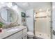 Spa-like bathroom with a large walk-in shower at 7 Elgin Pl # 502, Dunedin, FL 34698