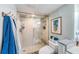 Modern bathroom with glass shower, built-in bench, and updated fixtures at 7 Elgin Pl # 502, Dunedin, FL 34698