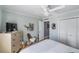 Guest bedroom with a ceiling fan and spacious closet at 7 Elgin Pl # 502, Dunedin, FL 34698