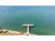 Fishing pier extending over calm waters at 7 Elgin Pl # 502, Dunedin, FL 34698