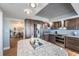 Gourmet kitchen boasting stainless steel appliances and granite counters at 7 Elgin Pl # 502, Dunedin, FL 34698