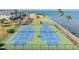 Two tennis courts next to waterfront property at 7 Elgin Pl # 502, Dunedin, FL 34698