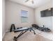 Home gym with weight bench and free weights at 701 Garden Oaks Sq, Seffner, FL 33584