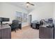 Home office with two desks and plenty of light at 701 Garden Oaks Sq, Seffner, FL 33584