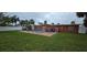 Backyard with pool and house view at 7063 S Shore S Dr, St Petersburg, FL 33707