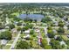 Aerial view of a house and surrounding neighborhood, showing the property's location and landscape at 7234 12Th N St, St Petersburg, FL 33702