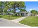 Cute bungalow with a spacious yard and driveway at 7234 12Th N St, St Petersburg, FL 33702