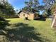 Spacious backyard with grassy area at 804 E 128Th Ave, Tampa, FL 33612