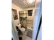 Full bathroom with shower/tub combo and decorative shower curtain at 804 E 128Th Ave, Tampa, FL 33612