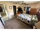 Spacious bedroom with a double bed and built-in shelving at 804 E 128Th Ave, Tampa, FL 33612