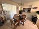 Bright dining area with table and chairs near kitchen at 804 E 128Th Ave, Tampa, FL 33612