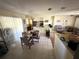 Kitchen and dining area with tiled floors and table at 804 E 128Th Ave, Tampa, FL 33612