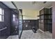 Bathroom with black and white tile and shower at 816 Knight St, Seffner, FL 33584