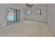 Spacious bedroom with pool view and sliding glass doors at 816 Knight St, Seffner, FL 33584