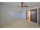 Bedroom with ceiling fan, closet, and access to bathroom at 816 Knight St, Seffner, FL 33584