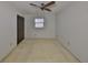 Spacious bedroom with ceiling fan and large closet at 816 Knight St, Seffner, FL 33584