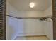 Walk-in closet with built-in shelves and hanging rods at 816 Knight St, Seffner, FL 33584