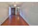 Spacious entryway with red brick tile floors and built-in shelving at 816 Knight St, Seffner, FL 33584