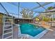 Inviting in-ground pool with a sliding board and screened enclosure at 816 Knight St, Seffner, FL 33584