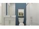 Bathroom with white subway tiles, a white vanity, and a shower/tub combo at 8418 Bella Mar Trl, Parrish, FL 34219