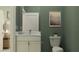 Simple bathroom with single vanity and toilet at 9443 Runaway Breeze Dr, Land O Lakes, FL 34637