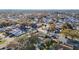 Wide aerial view of a residential neighborhood with houses and streets at 10214 Turtle Hill Ct, Tampa, FL 33615