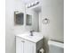 Clean bathroom with white vanity and updated mirror at 10214 Turtle Hill Ct, Tampa, FL 33615