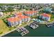 Luxury waterfront community with resort-style amenities, private boat docks, and beautiful landscaping at 1030 Bellasol Way # 402, Apollo Beach, FL 33572