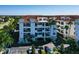 Aerial view of a modern building with ample parking at 1030 Bellasol Way # 402, Apollo Beach, FL 33572