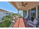 Relaxing balcony with water views and comfortable seating at 1030 Bellasol Way # 402, Apollo Beach, FL 33572