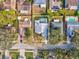 Aerial view showing a single-Gathering home with a pool in a residential neighborhood at 11123 Elmhurst Dr, Pinellas Park, FL 33782