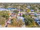 Aerial view of a single Gathering home in a quiet neighborhood at 11123 Elmhurst Dr, Pinellas Park, FL 33782