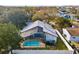 Aerial view showing house with a private pool and fenced backyard at 11123 Elmhurst Dr, Pinellas Park, FL 33782