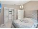 Grey bedroom with white closet and sliding barn doors at 11123 Elmhurst Dr, Pinellas Park, FL 33782