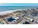 Aerial view showing the property's location near the beach and other buildings at 11730 Gulf Blvd # 49, St Petersburg, FL 33706