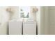 Bright laundry room with washer and dryer included at 12414 Sweet Angel Aura Way Ct, Parrish, FL 34219