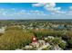 Aerial view showcasing a townhouse location in a wooded setting at 12746 Wood Trail Blvd, Tampa, FL 33625