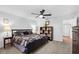 Second bedroom with a queen bed, ceiling fan, and lots of light at 12746 Wood Trail Blvd, Tampa, FL 33625