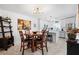 Open concept dining area with a view of the kitchen at 12746 Wood Trail Blvd, Tampa, FL 33625