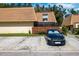 Exterior view of the townhouses and parking area at 12746 Wood Trail Blvd, Tampa, FL 33625