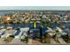 Aerial view of house and canal, showing location in community at 129 Wall St, Redington Shores, FL 33708