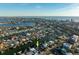 Aerial showing home's waterfront location at 129 Wall St, Redington Shores, FL 33708