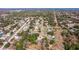 Home's location shown in a wide aerial view of neighborhood at 1454 Brigadier Dr, Spring Hill, FL 34608