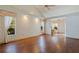 Spacious main bedroom with hardwood floors and large windows at 1454 Brigadier Dr, Spring Hill, FL 34608