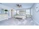 Charming bedroom with a rustic bed and plush carpet at 14834 Paddock Pond Ave, Lithia, FL 33547