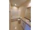 Clean bathroom with a bathtub, toilet and vanity at 18001 Richmond Place Dr # 721, Tampa, FL 33647